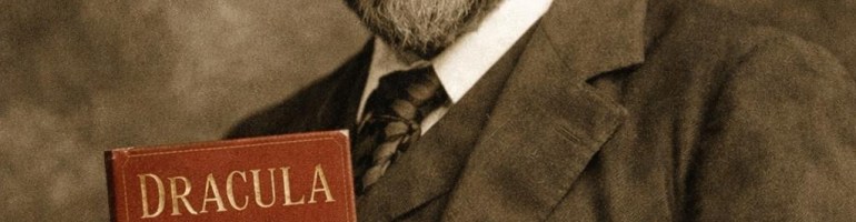 Man with beard holding a red book titled Dracula by Bram Stoker