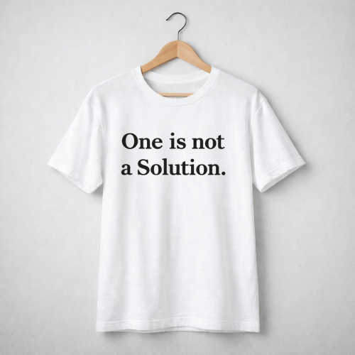 White t-shirt with large black quotation marks printed on the front