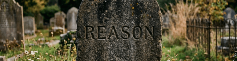Weathered gravestone engraved with the word REASON in a grassy, leafy cemetery