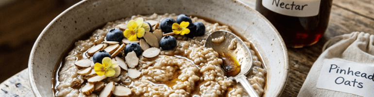 Bowl of porridge labeled Pinhead Oats beside jar labeled Netherlands Nectar